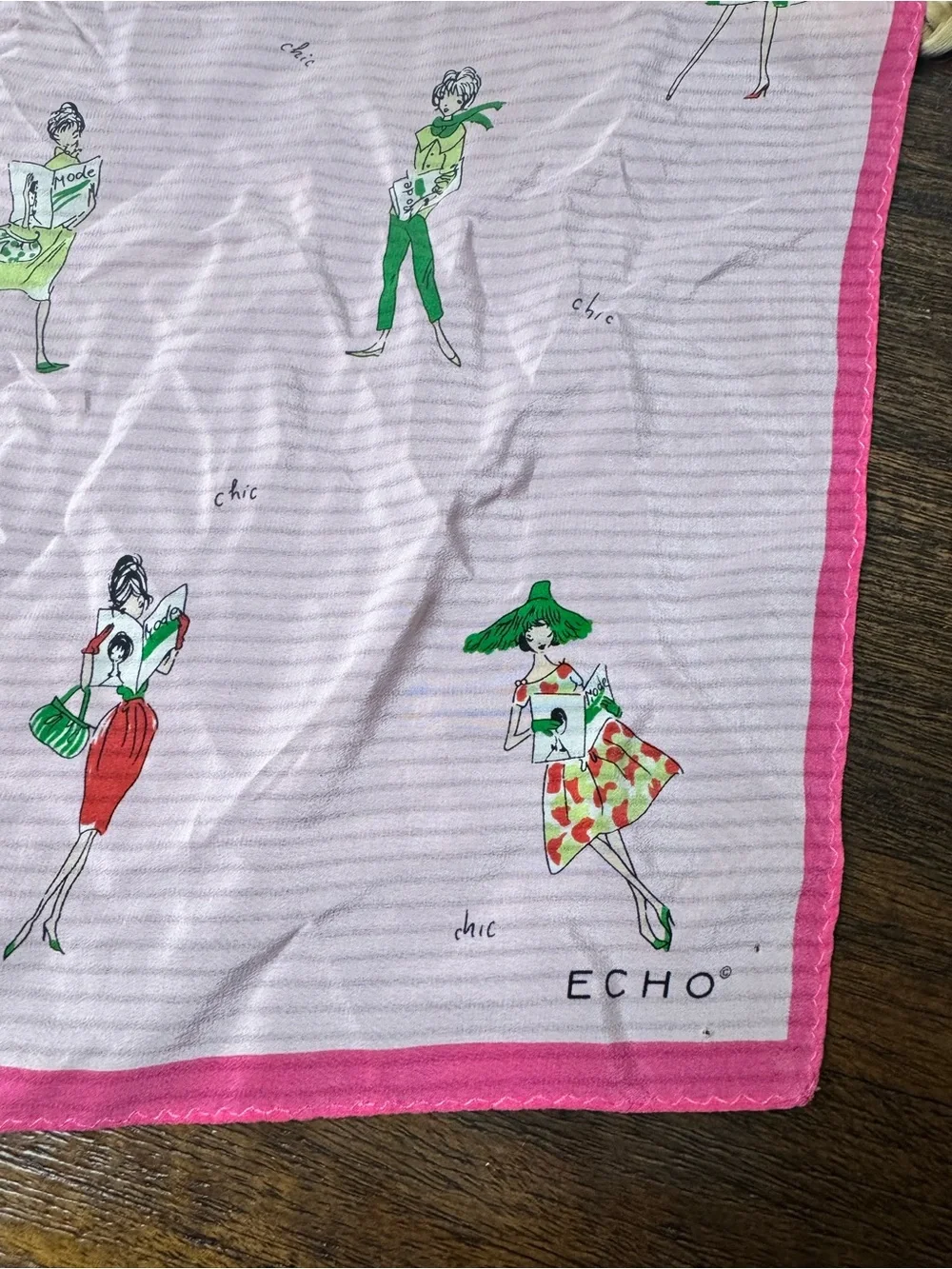 Echo Pink Scarf with Green and Red Fashion Figures